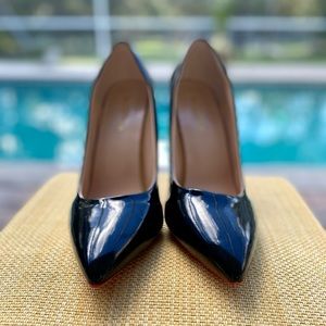 Woman’s Black & Red Bottom Heels